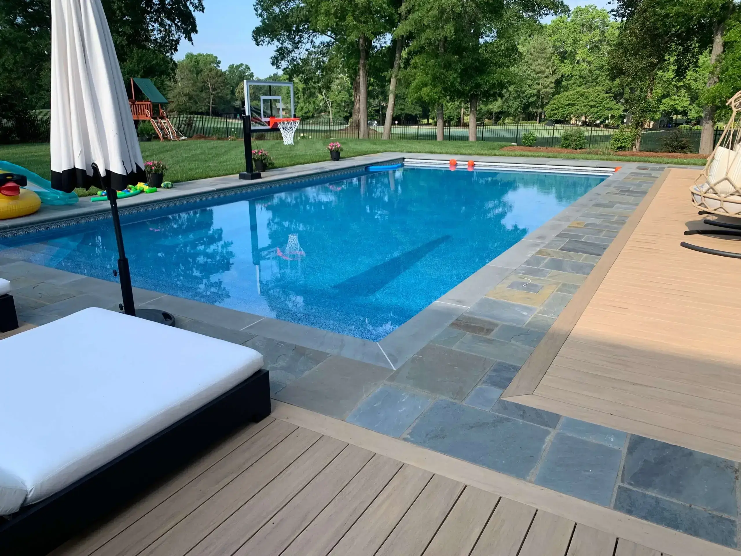 Linear rectangular pool with bluestone decking Chapel Hill