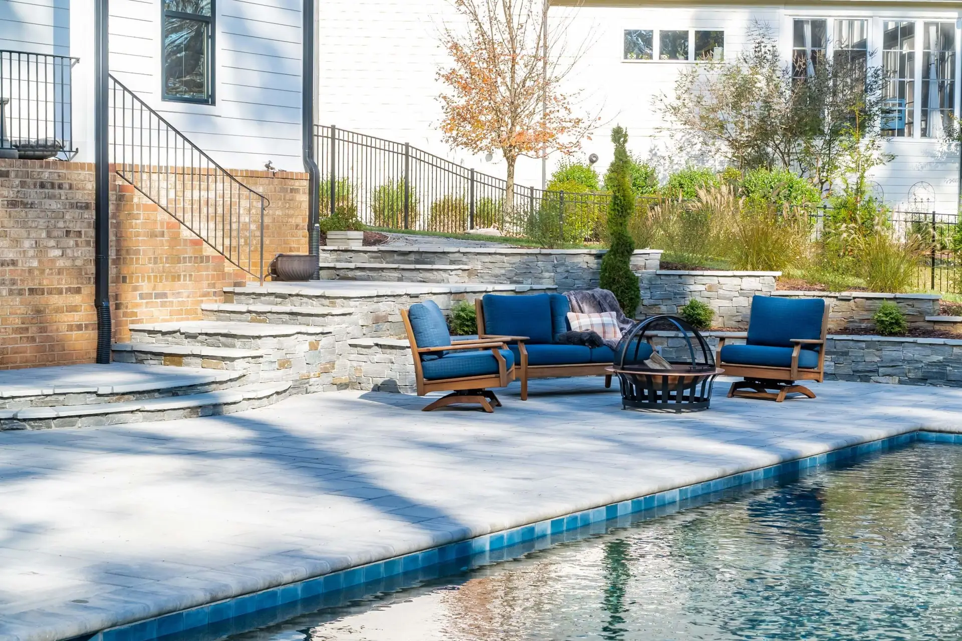 Wake Forest luxury outdoor living with stone work and Techo Bloc pavers