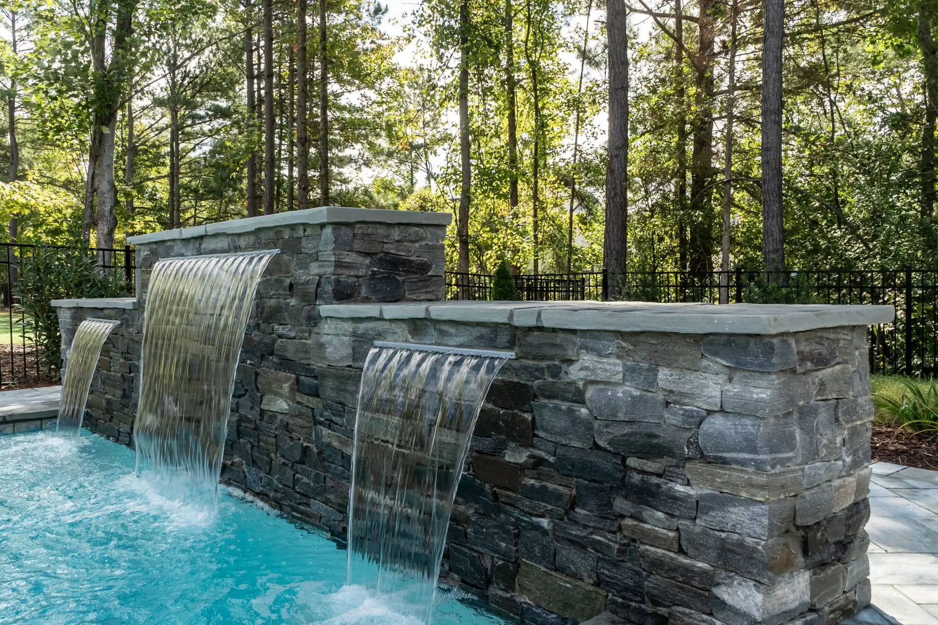 Toll Mill Vista Escape custom water feature wall with veneer and 3 sheer descents - angled view in Raleigh, NC